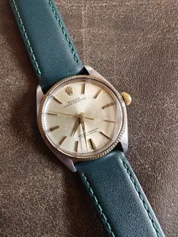 1960S ROLEX OYSTER PERPETUAL 34MM 1005 CHAMPAGNE 18K FLUTED AUTOMATIC WATCH