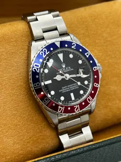 VINTAGE ROLEX GMT MASTER 1675 PEPSI RED AND BLUE STAINLESS STEEL 40MM