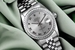 31 MM ROLEX DATEJUST SILVER ROMAN DIAL DIAMOND BEZEL STAINLESS STEEL WATCH