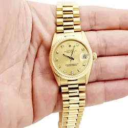 LADIES ROLEX 31MM