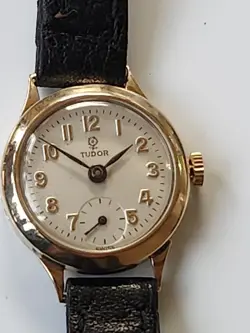 TUDOR ROLEX LADIES WATCH 9K SOLID GOLD HAND WINDING, VINTAGE LEATHER CASE AND...