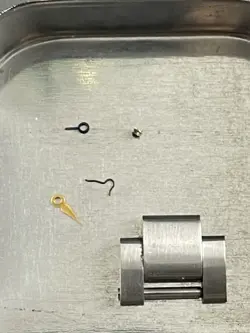 Rolex Parts Tin with parts and link inside