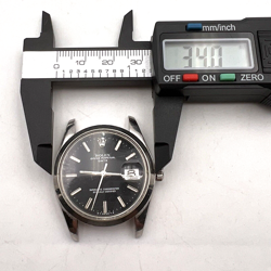 1975 ROLEX MODEL 1500 OYSTER PERPETUAL DATE JUST WRIST WATCH.