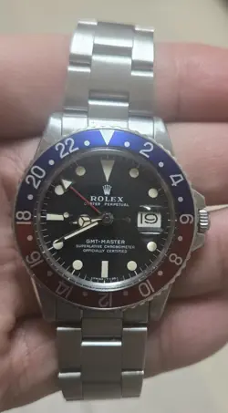 ROLEX GMT-MASTER 1675 SILVER OYSTER BRACELET WITH BLUE AND RED BEZEL