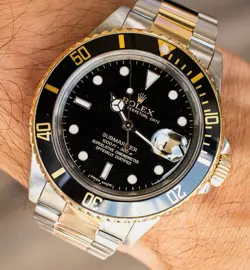 ROLEX SUBMARINER DATE 18K YELLOW GOLD BLACK STAINLESS STEEL 40MM 16803 WATCH