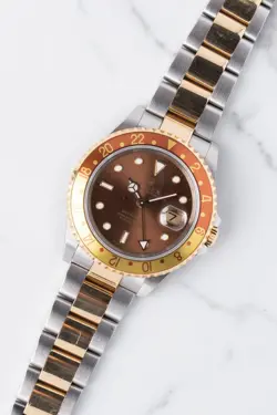2005 ROLEX GMT-MASTER II 16713 18K/SS BROWN AND GOLD ROOT BEER