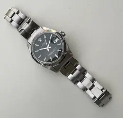 ROLEX OYSTER PERPETUAL DATE 1500 BLACK DIAL