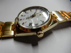 Men's Rolex Watch, gold, medium size, aftermarket gold band with some wear