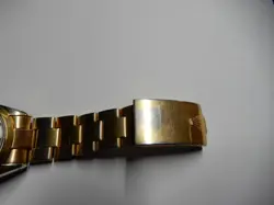 Men's Rolex Watch, gold, medium size, aftermarket gold band with some wear