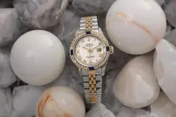 ROLEX DATEJUST 26 MM CREAM ROMAN DIAL SAPPHIRE & DIAMOND BEZEL TWO TONE WATCH