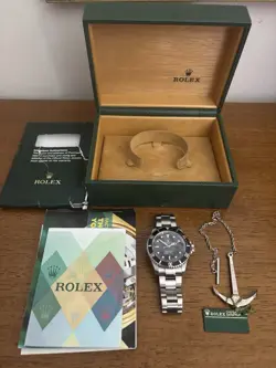 ROLEX SUBMARINER 16610 OYSTER BRACELET BOX AND PAPERS VERY GOOD CONDITION 
