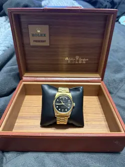 ROLEX DAY-DATE GOLD PRESIDENT BRACELET WITH BLACK BEZEL