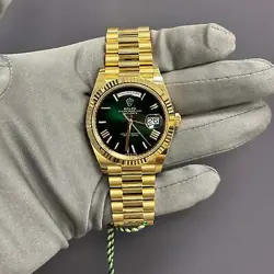 ROLEX DAY-DATE 40MM CHAMPAGNE DIAL WATCH 228238 YG