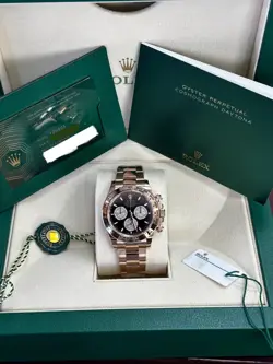 ROLEX 126505 COSMOGRAPH DAYTONA BLACK DIAL. WITH BOX & PAPERS.