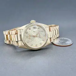 WOMEN'S ROLEX 18K