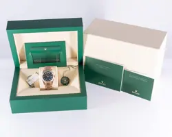 Rolex Daydate 36mm 128235-0085 Blue Baguette Dial Rose Gold 2024