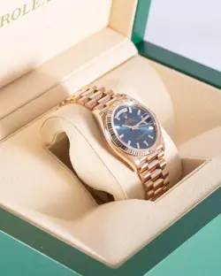 Rolex Daydate 36mm 128235-0085 Blue Baguette Dial Rose Gold 2024