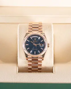 Rolex Daydate 36mm 128235-0085 Blue Baguette Dial Rose Gold 2024