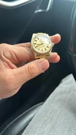 PERPETUAL DAY-DATE WRISTWATCH