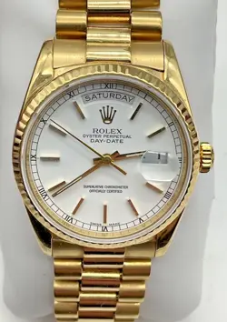 MEN’S ROLEX 18K