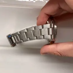 WRISTWATCH WITH PAPERS