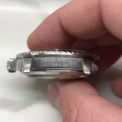 WRISTWATCH WITH PAPERS