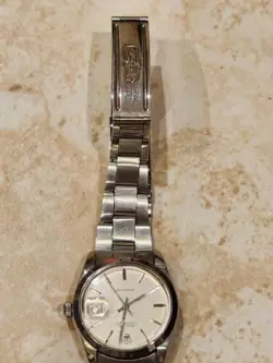 ROLEX OYSTERDATE PRECISION SILVER DIAL REF. 6694 SS 35mm MANUAL WIND WATCH.
