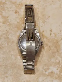 ROLEX OYSTERDATE PRECISION SILVER DIAL REF. 6694 SS 35mm MANUAL WIND WATCH.
