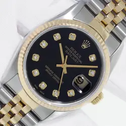 ROLEX DATEJUST BLACK DIAMOND DIAL STEEL AND 18 KARAT GOLD FLUTED BEZEL WATCH
