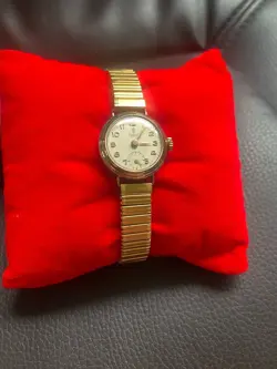 LADIES' VINTAGE TUDOR 9CT GOLD WATCH.