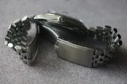 STEEL ENGINE-TURNED BEZEL