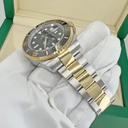 ROLEX SEA-DWELLER 126603 GOLD AND SILVER OYSTER BRACELET WITH BLACK BEZEL
