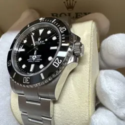 Rolex Submariner 124060  - Case has minor dent - see pictures
