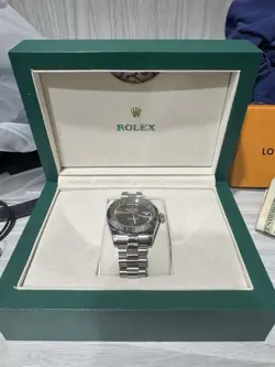 1 OF 1 ROLEX WATCH