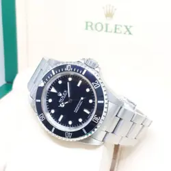 ROLEX 40MM BLACK SUBMARINER 14060 (N SERIES)