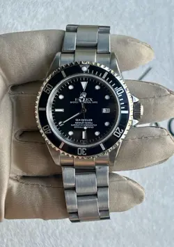 ROLEX SEA-DWELLER 16600 OYSTER BRACELET WITH PAPERS