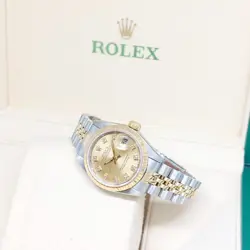 ROLEX 26MM 18K HALF YELLOW GOLD CHAMPAGNE DIAMONDS DATEJUST  REF: 69173 (E)