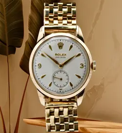 ROLEX PRECISION 9CT GOLD MANUAL WIND WATCH 32MM