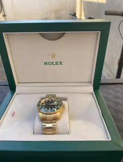 ROLEX SUBMARINER 126618LB GOLD OYSTER BRACELET WITH GREEN BEZEL