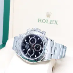 Rolex 40mm Black Indexes Steel Daytona REF: 116520 (AN series)