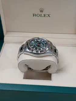 Unworn Rolex Sky-Dweller 336934-0001 Green Dial Oyster Bracelet 2025 STICKERS