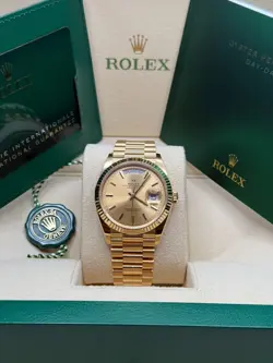 ROLEX DAY-DATE 36 CHAMPAGNE INDEX DIAL 18K YELLOW GOLD FLUTED BEZEL PRESIDENT
