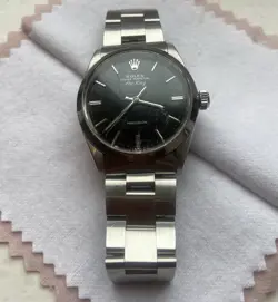 ROLEX OYSTER PERPETUAL, 34MM BLACK DIAL