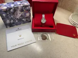 LADIES STAINLESS STEEL ROLEX WATCH DIAMOND BEZEL