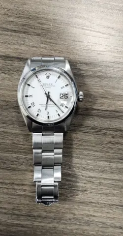 ROLEX OYSTER PERPETUAL DATE 1500 STAINLESS STEEL WHITE ROMAN DIAL WATCH 34MM