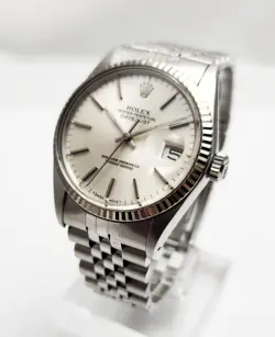 ROLEX DATEJUST 16014 SILVER DIAL WITH FLUTED BEZEL AND JUBILEE BRACELET