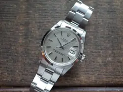 ROLEX OYSTER PERPETUAL DATE 1500 SILVER DIAL AUTOMATIC WINDING WRISTWATCH