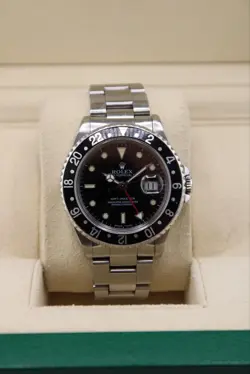 ROLEX GMT-MASTER II 16700 SILVER OYSTER BRACELET WITH BLACK BEZEL