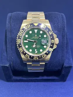 ROLEX GMT-MASTER II GREEN DIAL BLACK CERAMIC 18K YELLOW GOLD 40MM OYSTER 116718