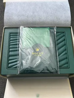 ROLEX SUBMARINER 124060 SILVER OYSTER BRACELET WITH BLACK BEZEL